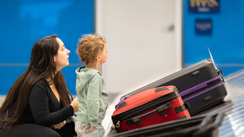 Baggage Claim Mom and Son 001